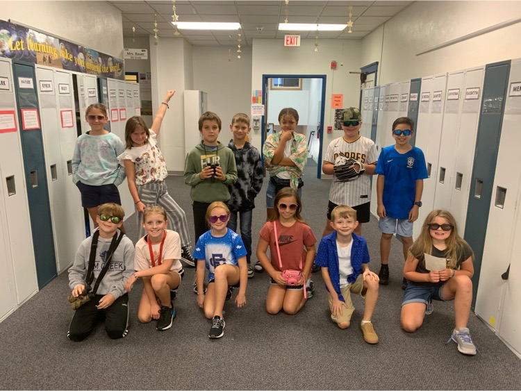 Third floor students dressed up for tourist day! 📸🕶️